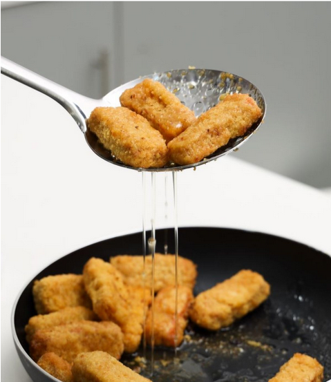 مغرفة طعام مثقبة