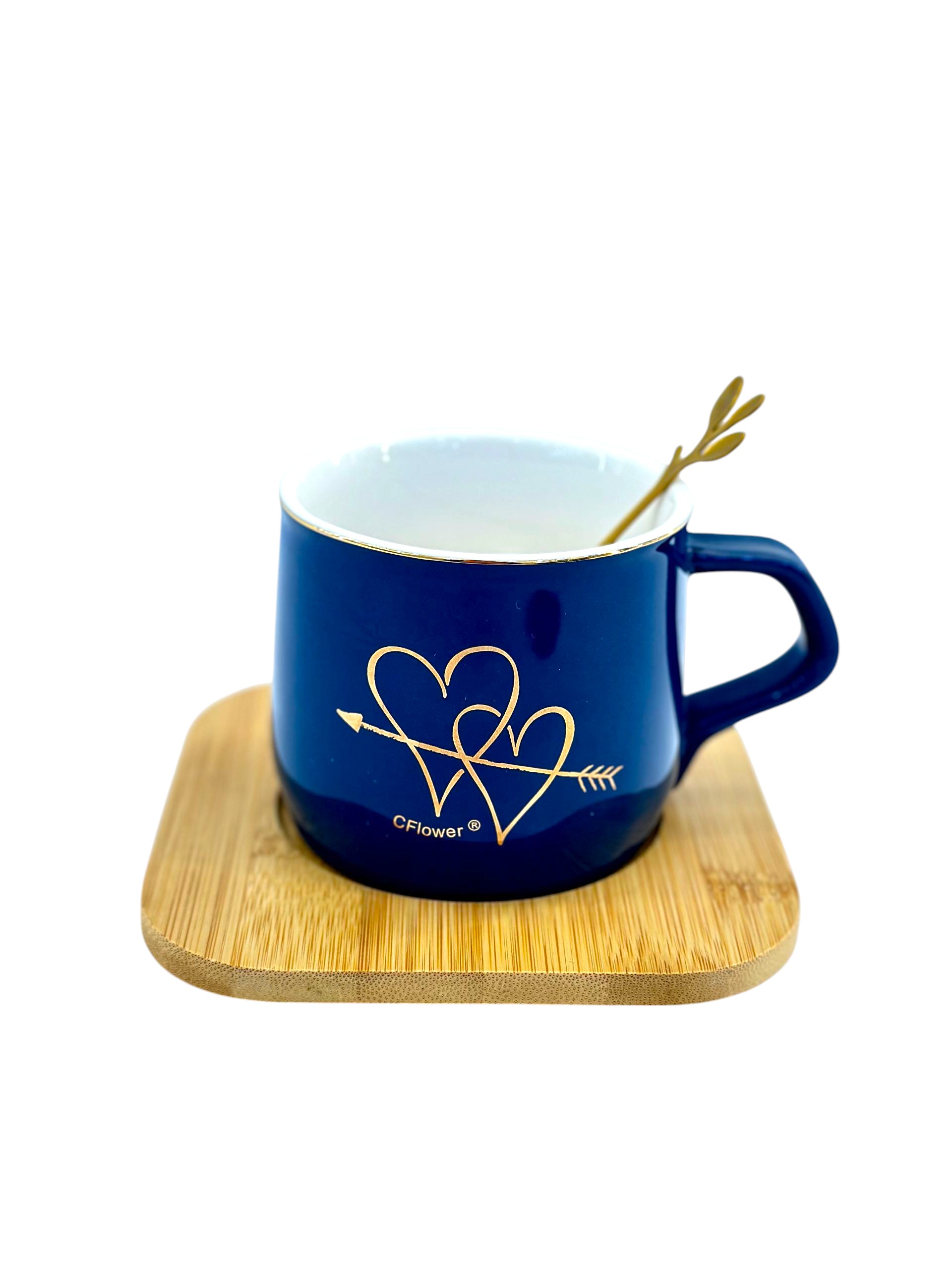 Ceramic mug with wooden base and spoon