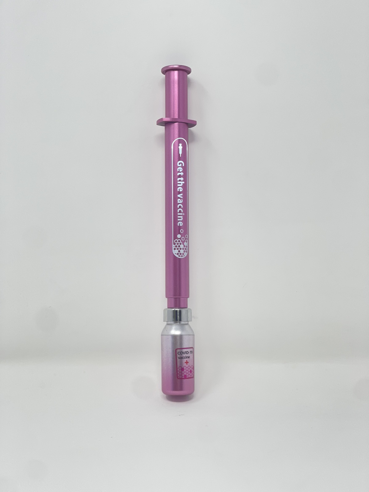 novelty pen designed to resemble a syringe or vaccine applicator