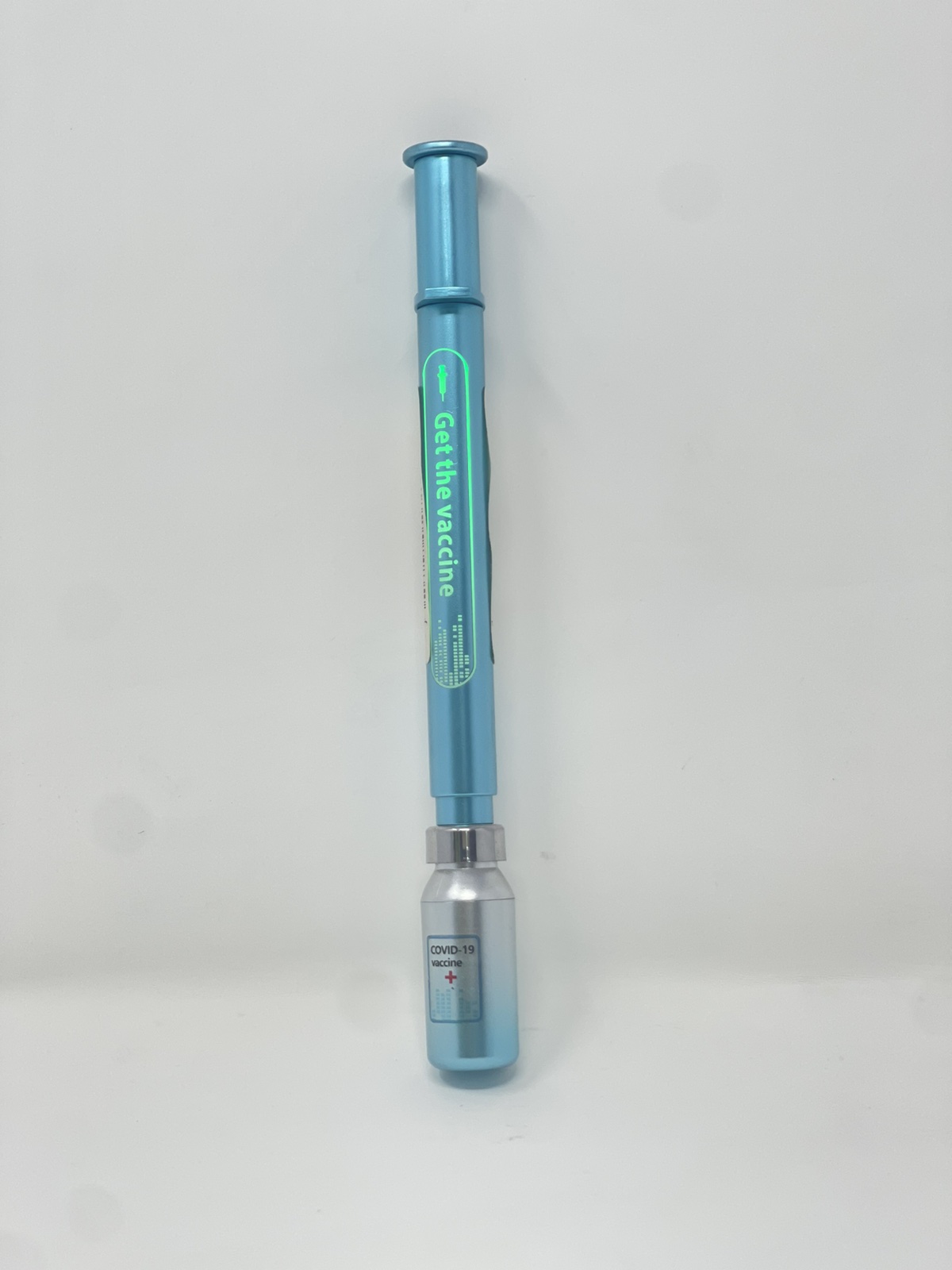 novelty pen designed to resemble a syringe or vaccine applicator