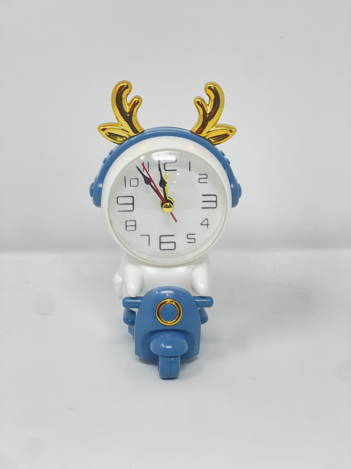ساعة منبه على شكل كرتوني